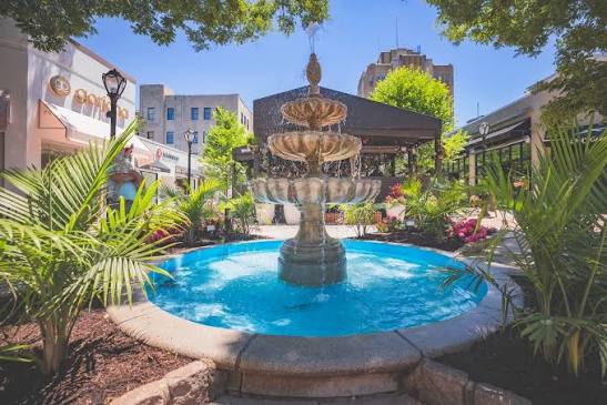 Fountain and landscaped courtyard at Suburban Square in Ardmore, Pennsylvania, in the Lower Merion School District.